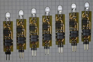 Seven oscillators before the modification. The grid on the paper is 4 mm. (Click to enlarge)