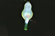 Tube with a flower shaped fluorescent target with dark background (click to enlarge)