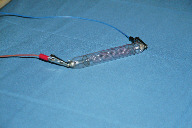 Simple S-shaped tube in a tube in bright flash light (click to enlarge)