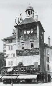 Picture of the Tour de l'Ile in Geneva around 1875 with its three clocks. (click to enlarge)