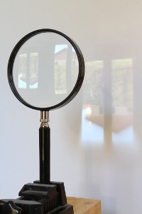 This magnifier lens is projecting an image of the view outside the window on a screen (click to enlarge).