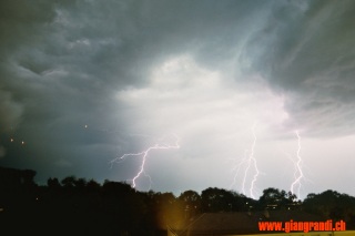 Lightning strikes from my window, 20mm f/2.8 60s