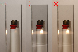 A glass in front of a lighter and a lit candle on the side. Left: horizontally polarized; middle: vertically polarized; right: not polarized. 35 mm, f/16, 1/2 s, 1/2 s, 1/6 s (respectively), ISO-400. Exposure was adjusted to take into account polarizer losses. (click to enlarge)